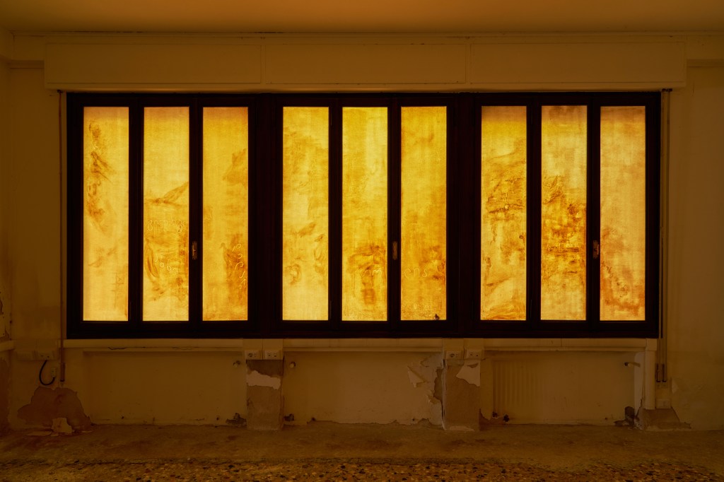 each year, the same season (2025) by Tolia Astakhishvili, made of plexiglass, acrylic paint, and wood, measuring 480 by 180 cm. The large-scale work juxtaposes translucent and painted surfaces in a layered architectural composition.