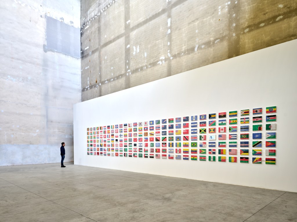 Installation view of The World Flag Ant Farm (2025) by Yukinori Yanagi, exhibited at Pirelli HangarBicocca, Milan, 2025. Photo by Agostino Osio. Courtesy of the artist and Pirelli HangarBicocca.