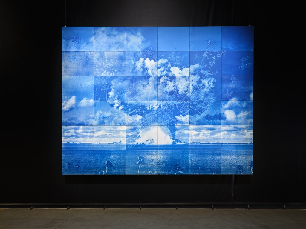 Installation view of Nagato x Operation Crossroads “Baker”, July 25, 1946 (2024) by Yukinori Yanagi, a cyanotype exposed by the sun on July 25, 2024, exhibited at Pirelli HangarBicocca, Milan, 2025. Photo by Agostino Osio. Courtesy of the artist and Pirelli HangarBicocca.