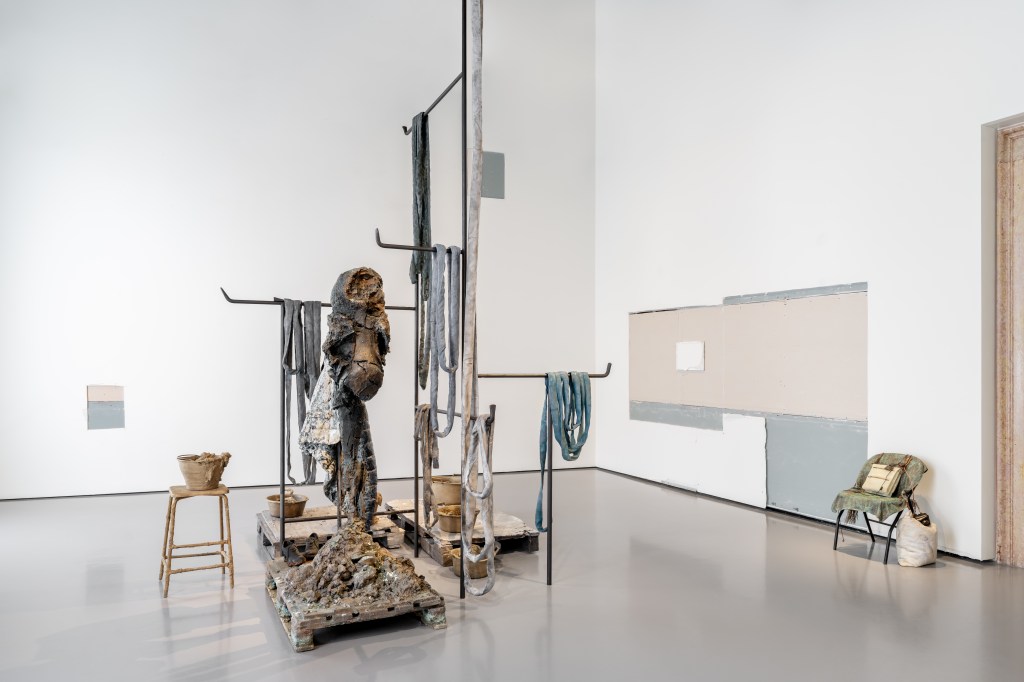 Installation view of The Residents (2021–2025), collection of the artist, courtesy Gagosian, and The Guardian (2019), Pinault Collection, by Tatiana Trouvé. From the exhibition The Strange Life of Things at Palazzo Grassi, Venice, 2025. Photo by Marco Cappelletti and Giuseppe Miotto / Marco Cappelletti Studio. © Tatiana Trouvé, by SIAE 2025. © Palazzo Grassi, Pinault Collection.