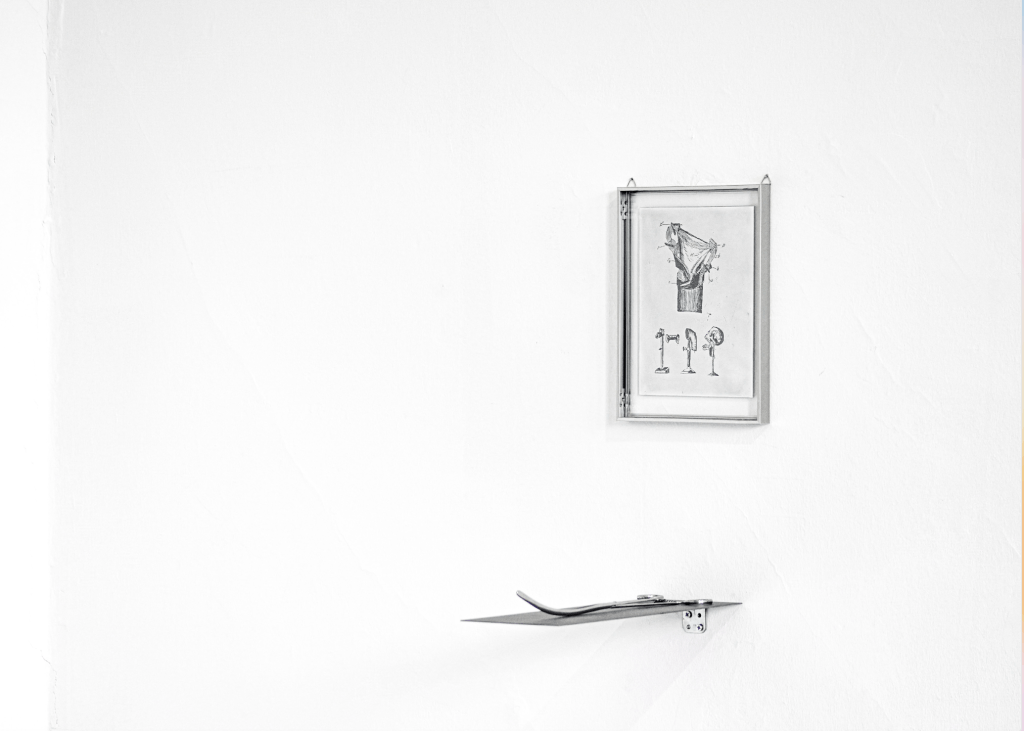 Installation view of fix it till you make it (2025), a mixed-media work by Flavia Spasari incorporating archival materials, medical imaging (ultrasound and X-ray), engraving, a laryngeal polyp forceps, and a walkman. Shown in the exhibition Overlapping Heads at Palazzetto Tito, Fondazione Bevilacqua La Masa, Venice. Courtesy of the artist