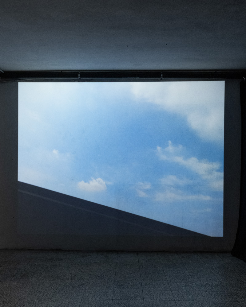 Installation view of Luccica segreto (It Could Be Calm and Yet It Is a Potential Hell; Movement IV) (2024), HD video in loop, created by Marta Magini with editing by Oleksandra Horobets. Courtesy of the artist