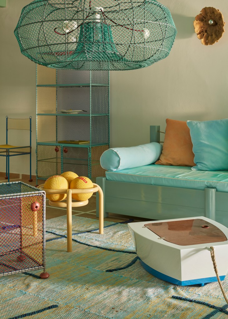 A colorful, immersive installation blending art and design, created by Superpoly for 4Rooms Design on the island of Kastellorizo