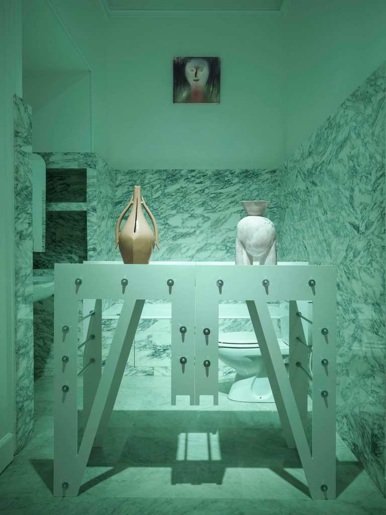 A vibrant and eclectic art installation capturing nostalgia and futurism, exhibited in Nice by the collective La Gayascienza.