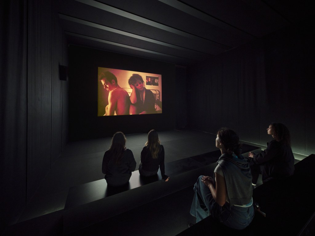 Installation view of The Ballad of Sexual Dependency by Nan Goldin, presented as large projected sequences in a dark gallery at Pirelli HangarBicocca, Milan, 2025. Photo by Agostino Osio