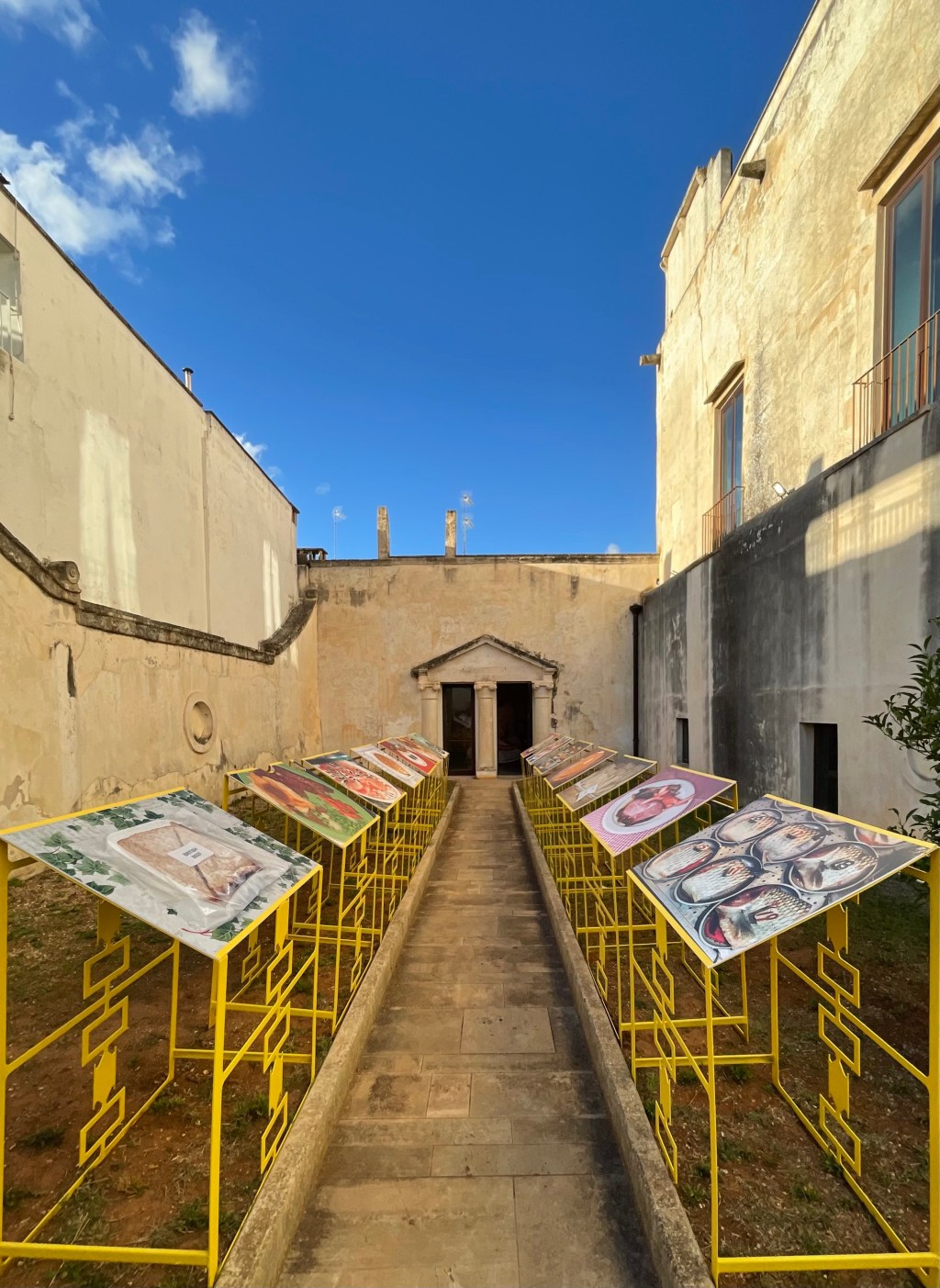 Exhibition view of Snack It! by Martin Parr at Palazzo dei Marchesi del Tufo, Matino, for Yeast Photo Festival 2025. Photo by Alice Longo.