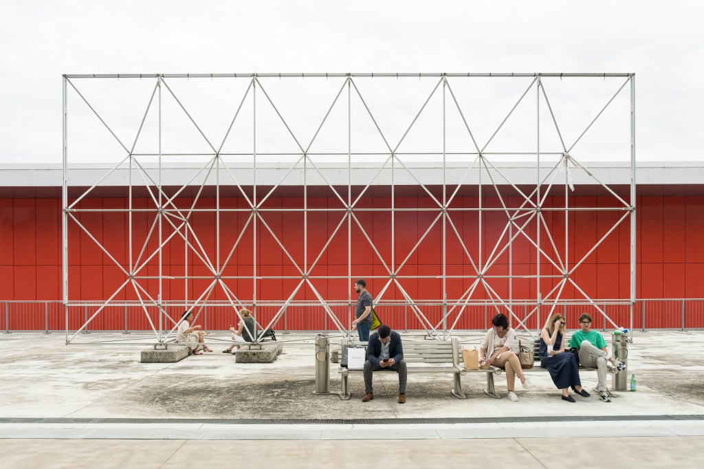 Exhibition view of Salone del Mobile.Milano showing visitors among design installations. Photo by Delfino Sisto Legnani