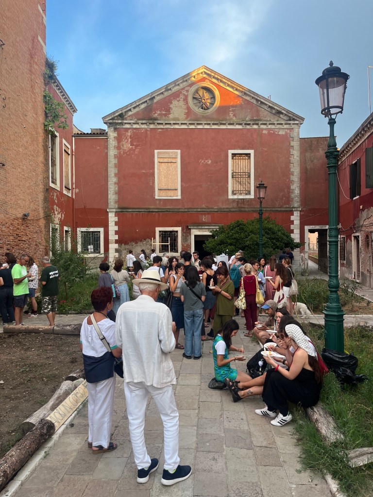 Celebration of the Feast of Sant’Anna, with people gathered outdoors for a communal event.