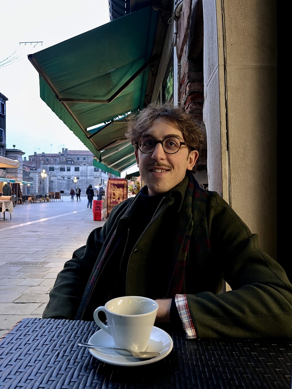 Portrait of Matteo Binci, photographed against a neutral background