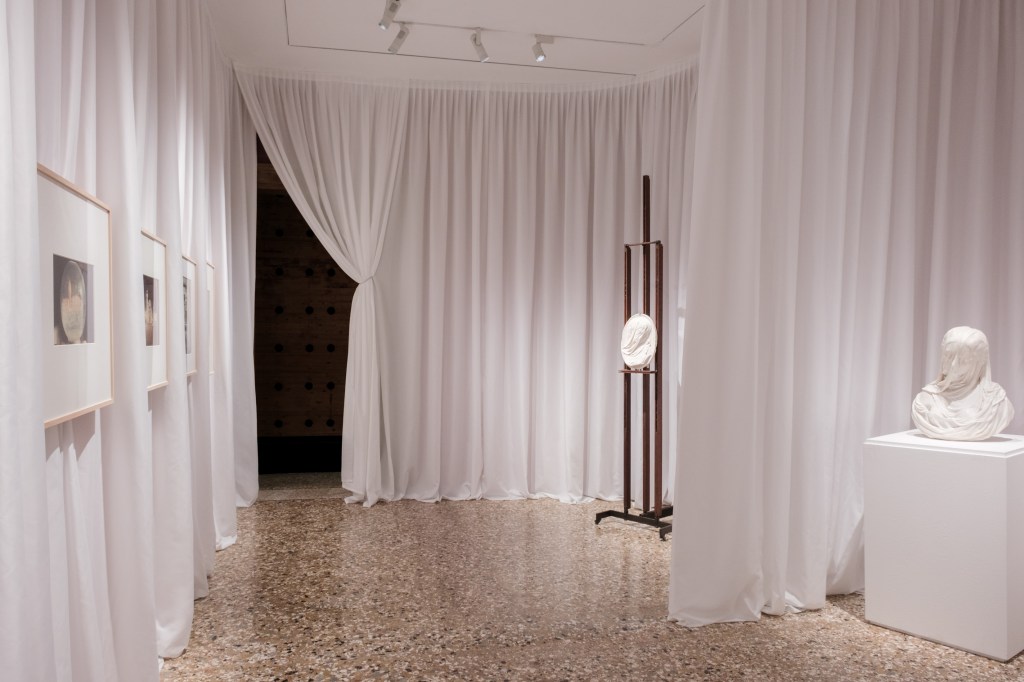 Exhibition view of “Disapparire” at Fondazione Querini Stampalia, Venice, featuring works by Antonio Corradini and Luigi Ghirri.