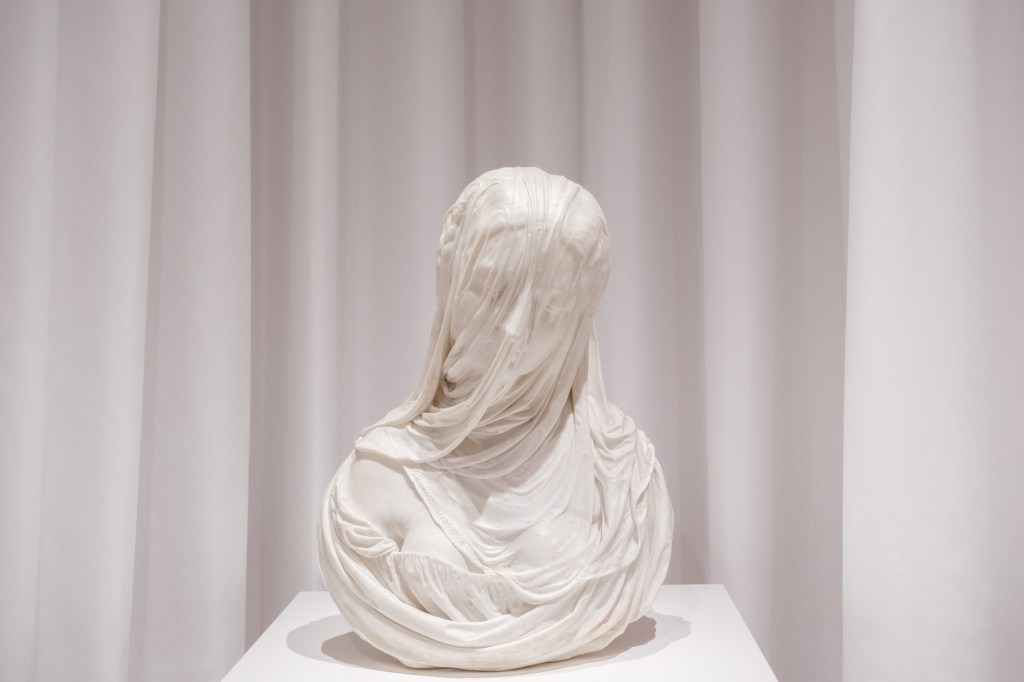 Exhibition view of “Disapparire” at Fondazione Querini Stampalia, Venice, featuring works by Antonio Corradini and Luigi Ghirri.