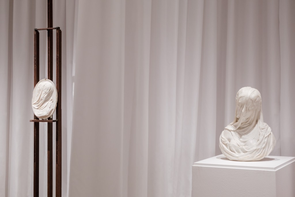 Exhibition view of “Disapparire” at Fondazione Querini Stampalia, Venice, featuring works by Antonio Corradini and Luigi Ghirri.