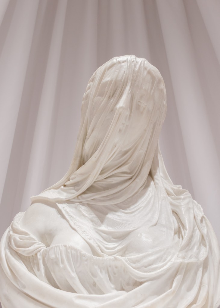 Exhibition view of “Disapparire” at Fondazione Querini Stampalia, Venice, featuring works by Antonio Corradini and Luigi Ghirri.