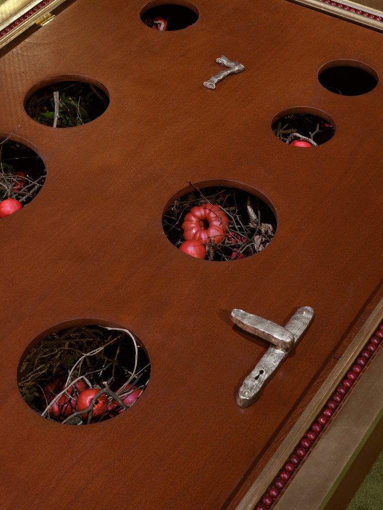 Detail of Porta pomi d’oro by Benni Bosetto in an installation at Pirelli HangarBicocca.