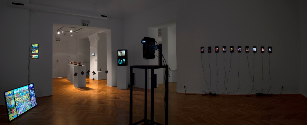 Exhibition view of Stop and Go. The Art of Animated Gifs at MGLC, Ljubljana, displaying animated GIF artworks within a gallery environment.