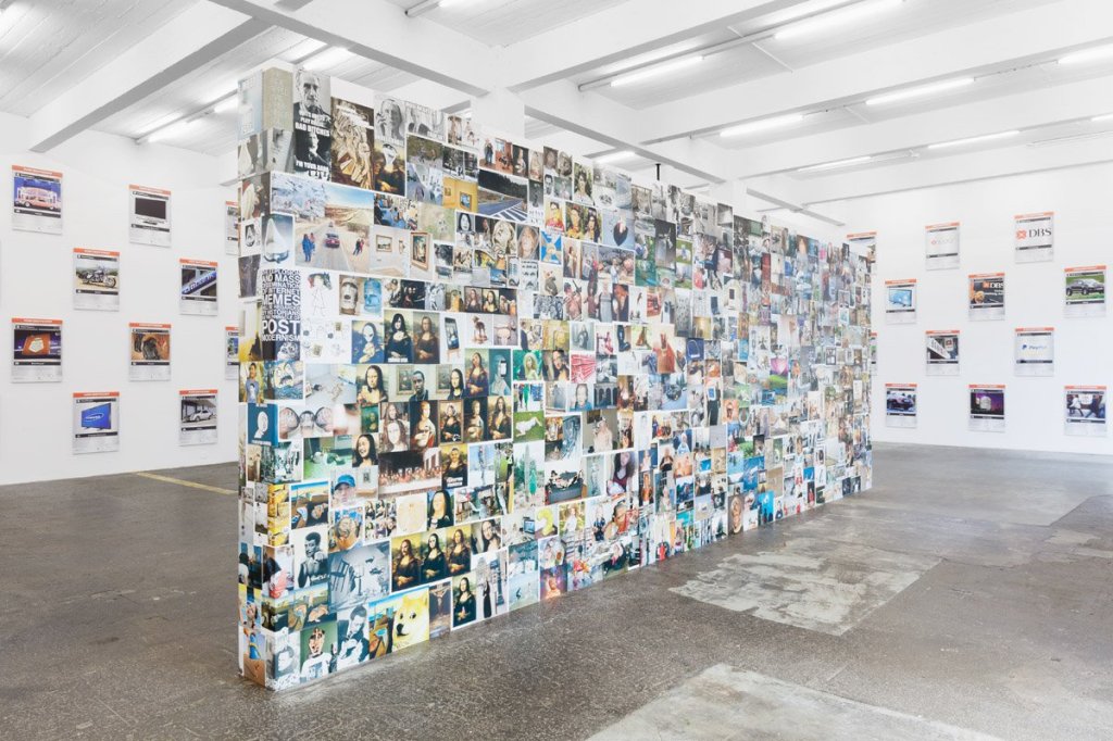 Exhibition view of The Great Wall of Memes – The Darknet. From Memes to Onionland by Valentina Tanni at Kunst Halle Sankt Gallen, featuring an extensive visual display of internet meme culture.