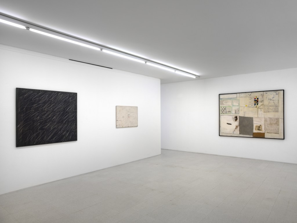 Exhibition gallery displaying artworks by Cy Twombly and Gastone Novelli.