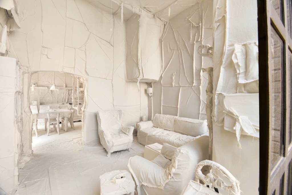 Exhibition view of Ca’ Dora in Venice, 2026, showing the installation within the historic interior spaces. Photo by Giulio Favotto.