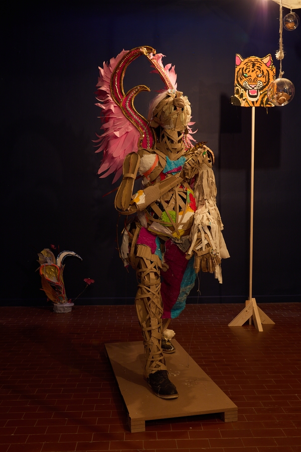 Lavar Munroe (with John Beadle), However Long the Night, the Dawn Will Break (2026), site-specific installation incorporating salvaged Junkanoo costumes, used Bahamian newspapers, mixed media, and materials from John Beadle's studio
