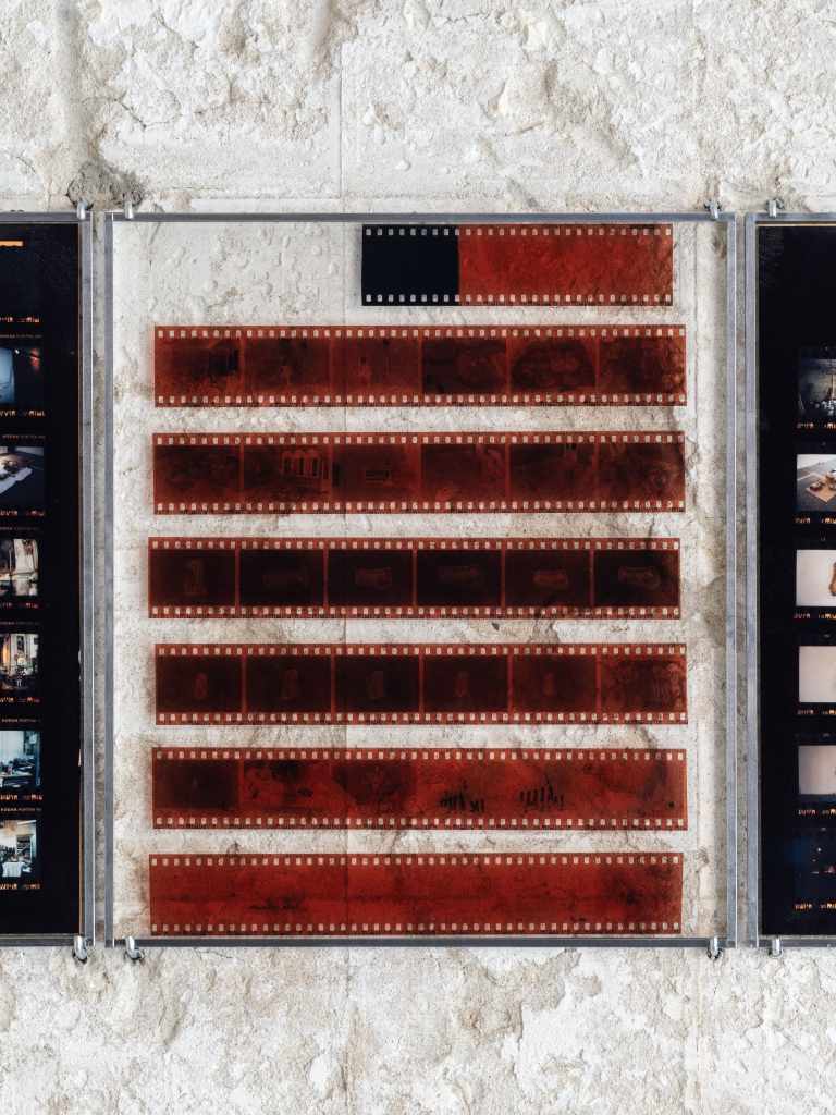 324 Photos: Hundreds of small photographs arranged in a dense grid, documenting locations across Venice and nearby islands, creating a visual archive of places and everyday scenes