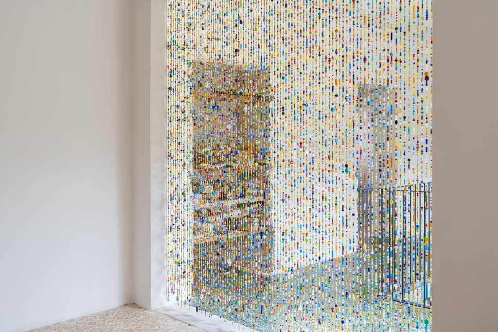 5 Works (installation view): Wide view of the exhibition gallery showing multiple artworks installed throughout the space, with visitors able to experience the relationships between different pieces